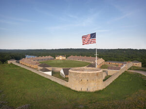 A military fort (Historic Fort Snelling) with an American flag flying