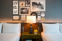 Queens Queen with nightstand and wall art
