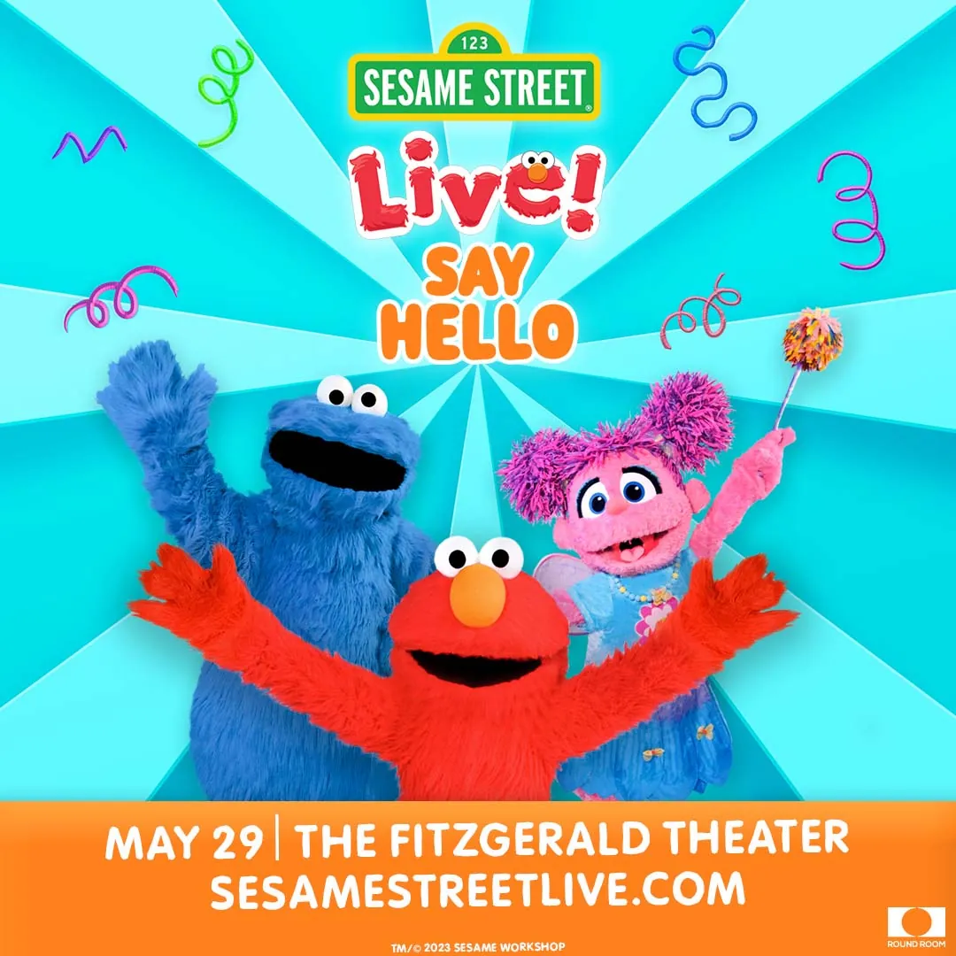 A Sesame Street Say Hello poster, with Cookie Monster, Elmo, and Abby Cadabby