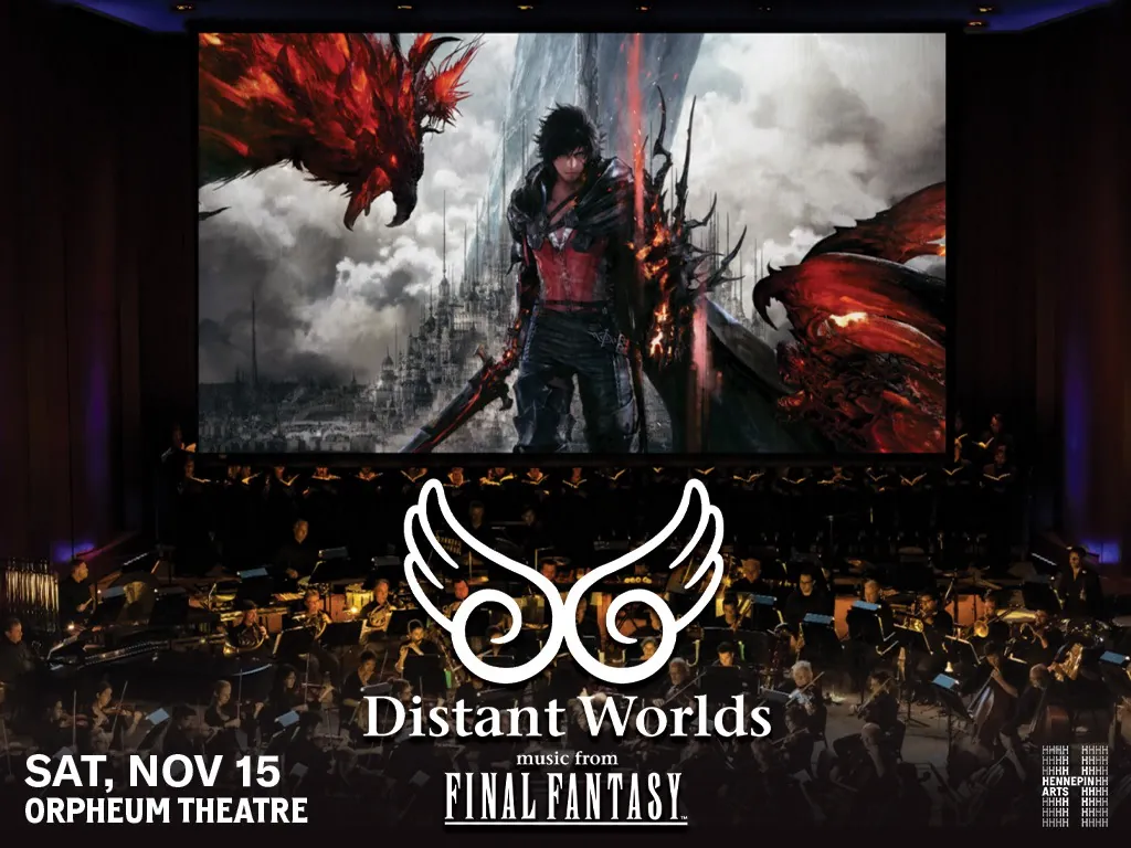 A screengrab from Final Fantasy is projected onto a screen behind an orchestra