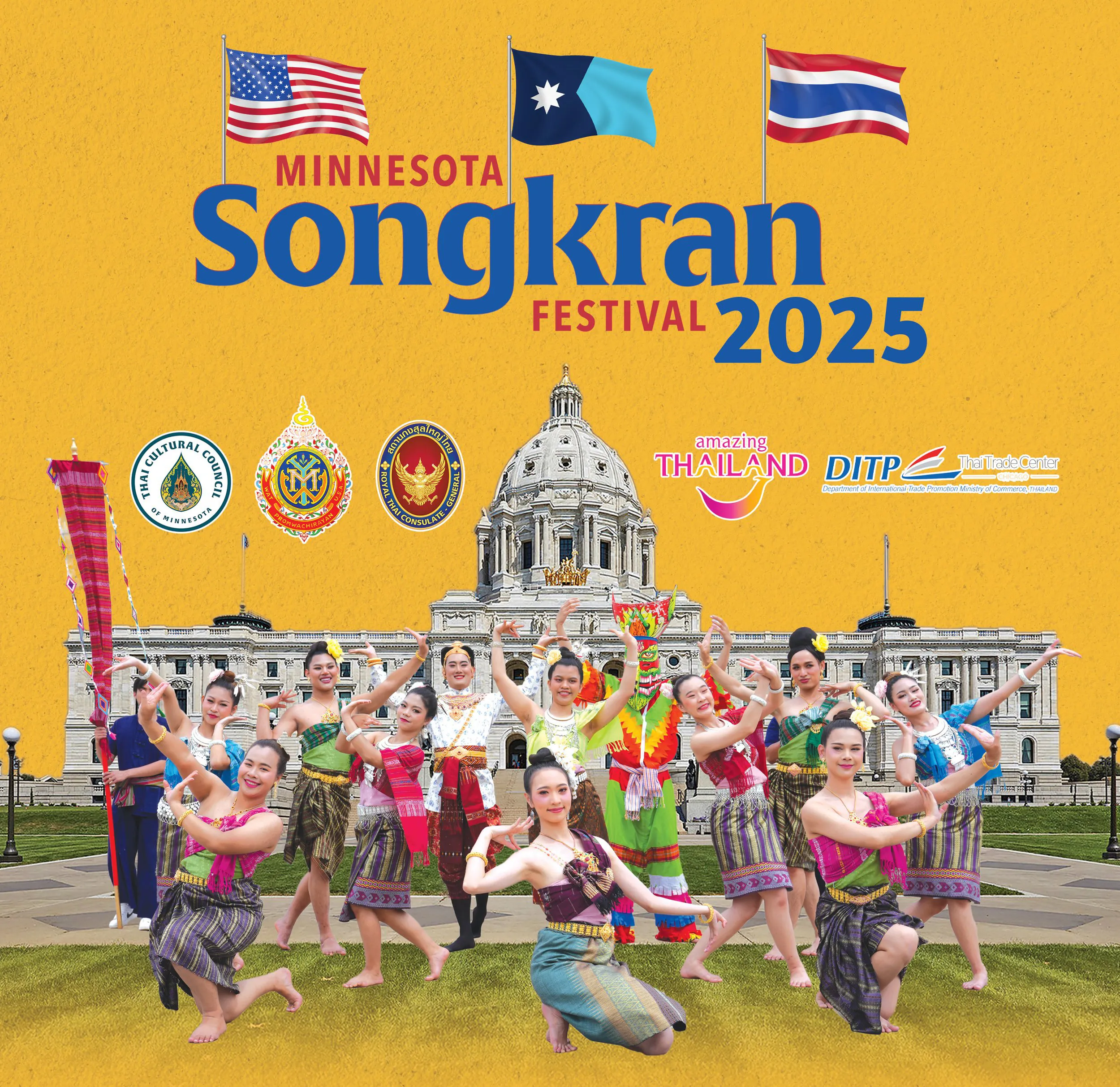 A group of Thai performers strike a pose in front of the Minnesota State Capitol