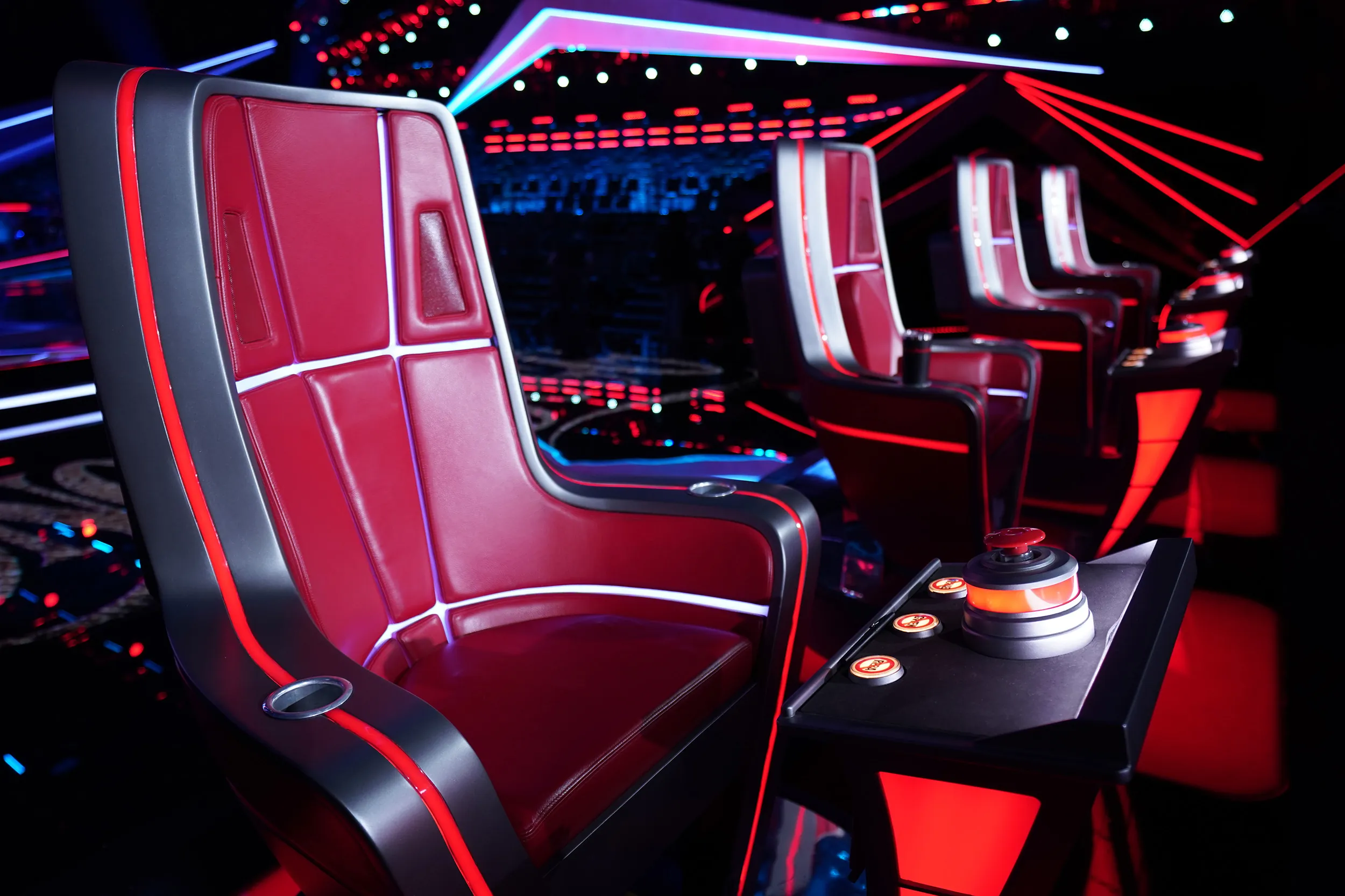 The set of The Voice, with 4 red leather chairs
