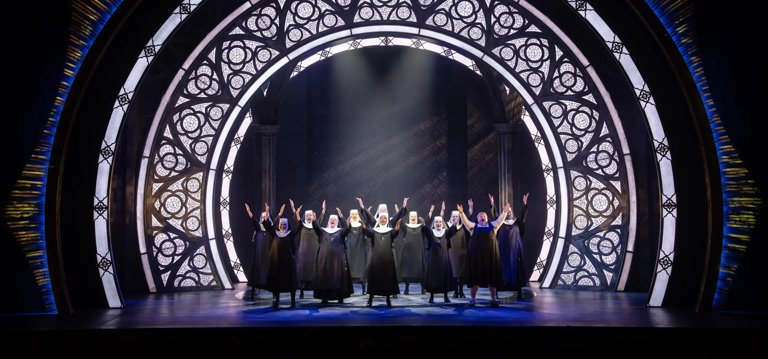 A cast of nuns dances and sings