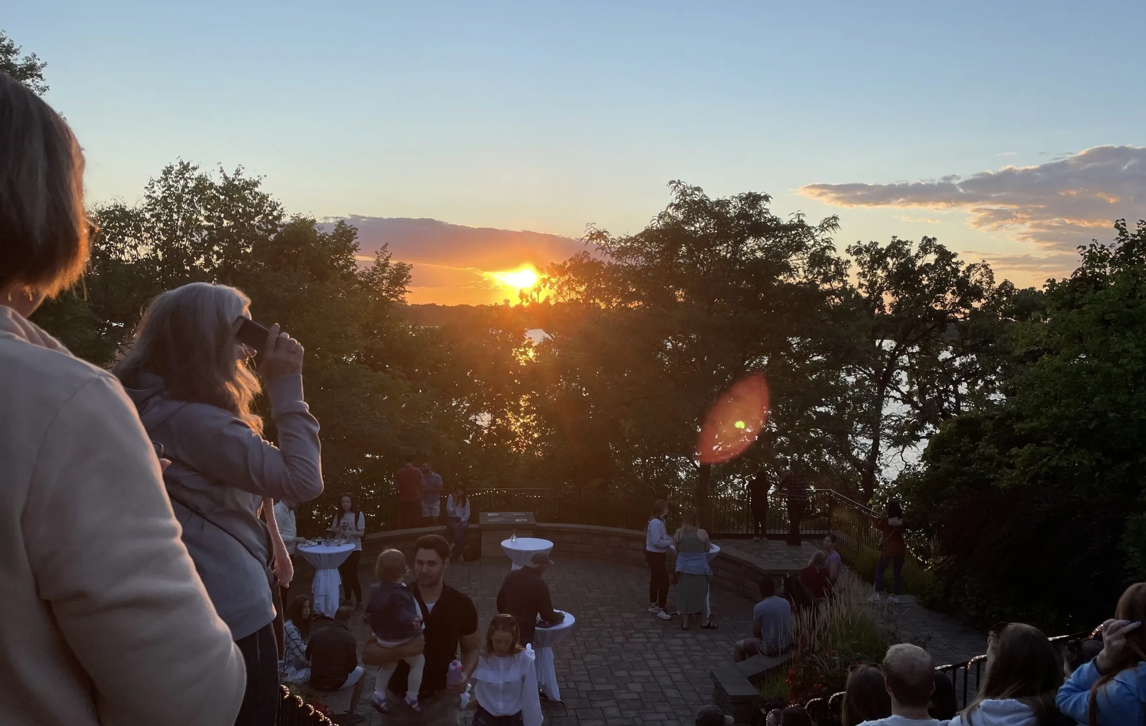 Sun sets over Lake Bde Maka Ska during the Greek Fest