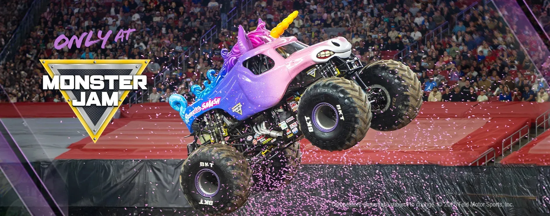 Monster Jam truck - Sparkle Smash - jumping through the air.
