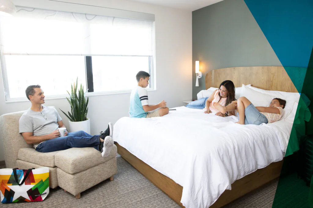 image of family in hotel guest room